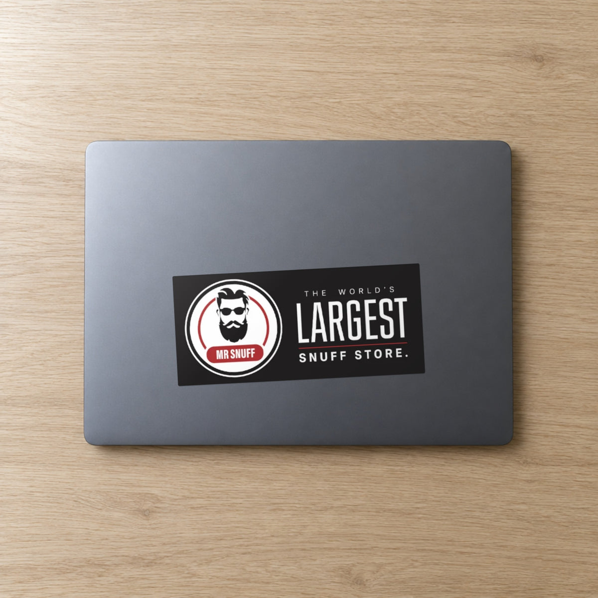 Mr Snuff 180 x 80 mm bumper sticker on a laptop lid